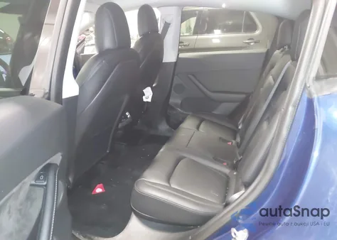 2022 Tesla Model Y Long Range Dual Motor All-Wheel Drive z USA, uszkodzony, nr VIN 7SAYGDEE1NF313449